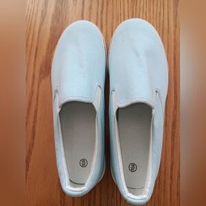 Light Blue Slip-On Sneakers New. Size 10